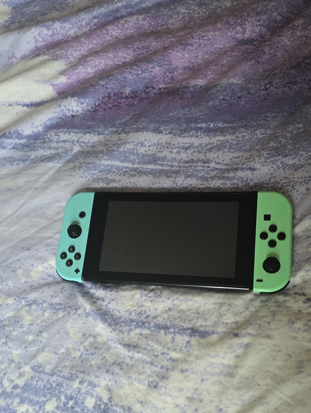 Nintendo Switch with Mint Green Joy-Con Pair
